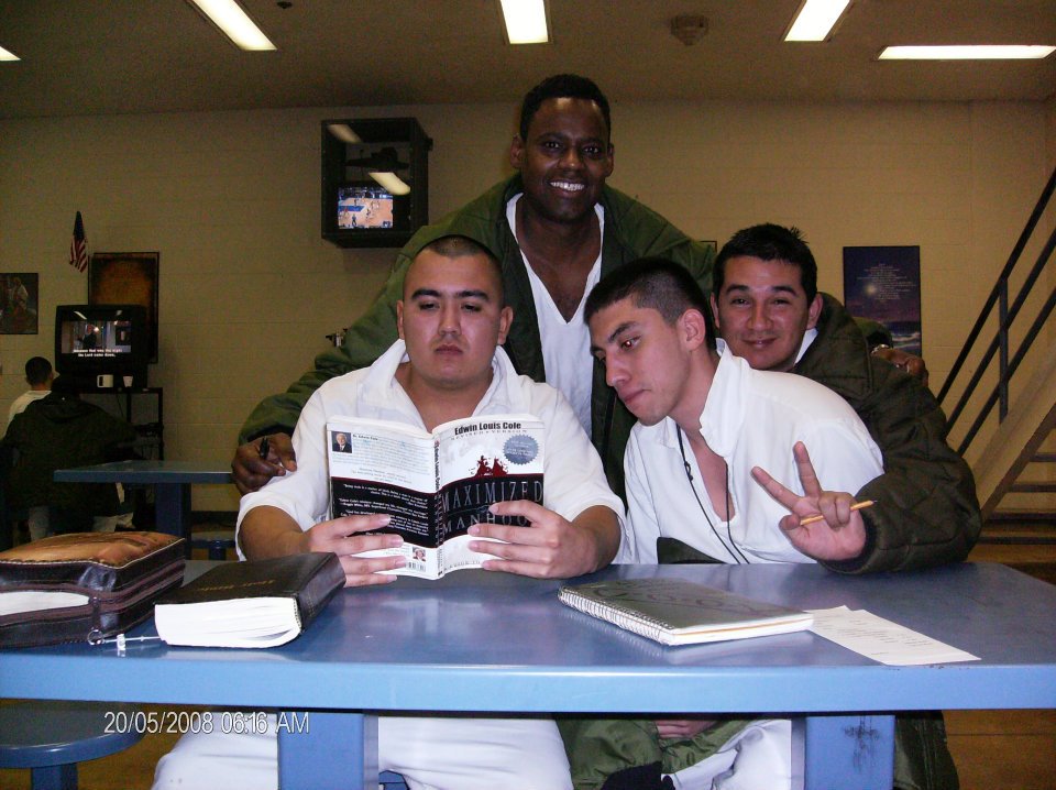Inmates studying Maximized Manhood